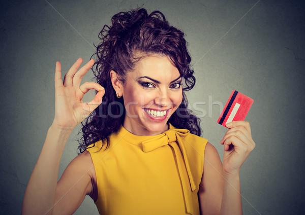 woman holding credit card showing ok sign  Stock photo © ichiosea
