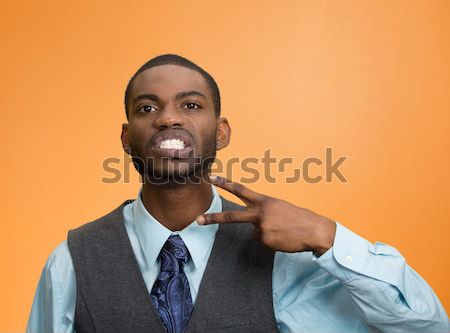 Stock photo: smiling man giving thumbs up
