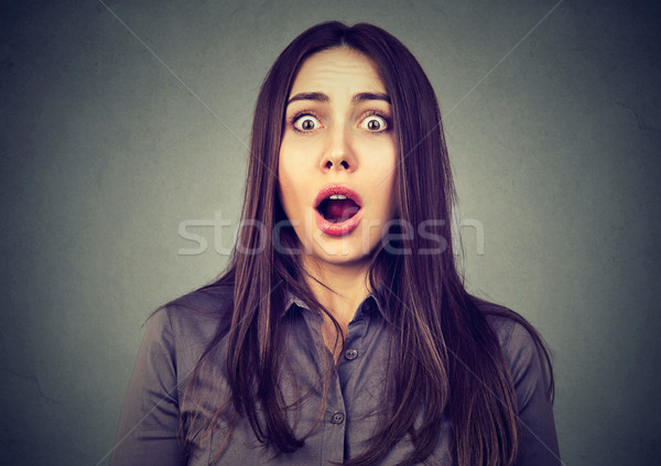 Portrait of a shocked girl Stock photo © ichiosea
