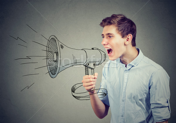Man screaming in a megaphone making announcement   Stock photo © ichiosea