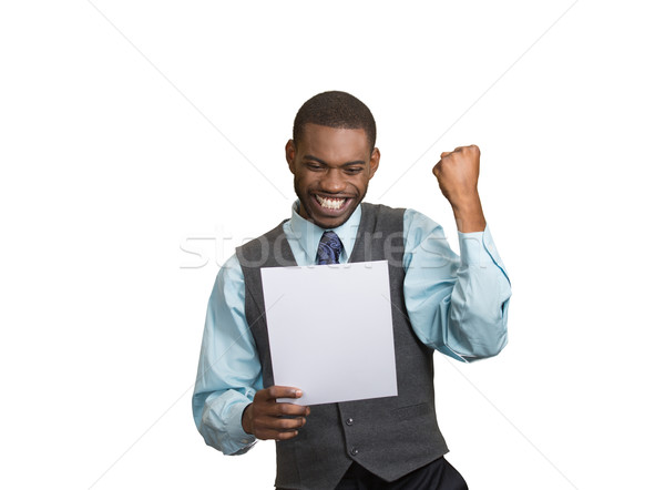 Excited happy man holding document, receiving goood news Stock photo © ichiosea