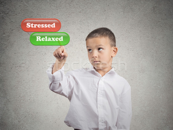 Boy pushing relaxed button mode on touch screen dispaly Stock photo © ichiosea