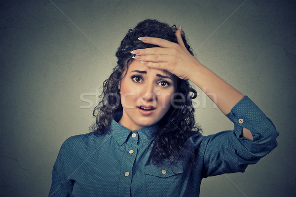 woman looking shocked, surprised, hand on head stressed realized mistake Stock photo © ichiosea