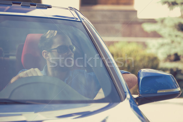 Confident man in his new car  Stock photo © ichiosea