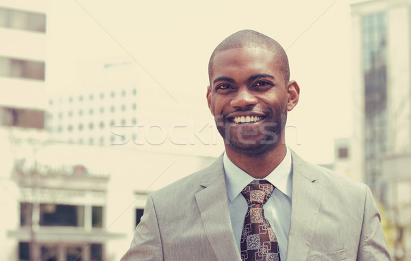 Headshot portrait of young man smiling  Stock photo © ichiosea