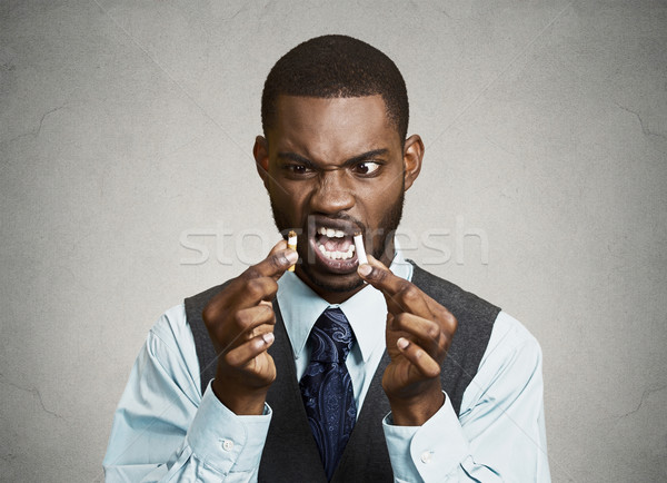 Upset angry business man breaking cigarette Stock photo © ichiosea