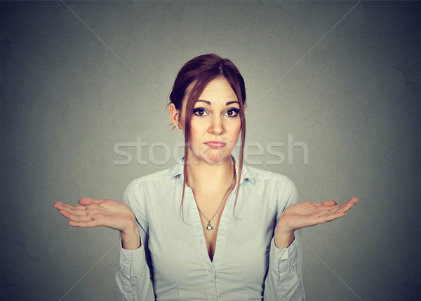 Woman with arms out shrugs shoulders so what I don't know  Stock photo © ichiosea
