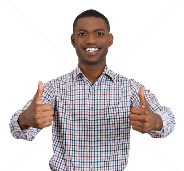 Stock photo: man smiling giving two thumbs up sign