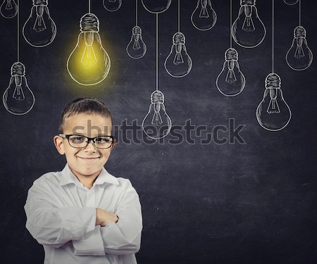 Mare idee inteligent băiat soluţie bec Imagine de stoc © ichiosea