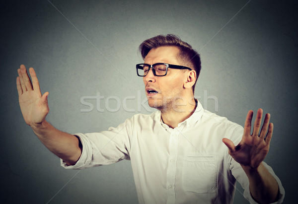 blindfolded business man stretching arms out eyes closed sightless  Stock photo © ichiosea