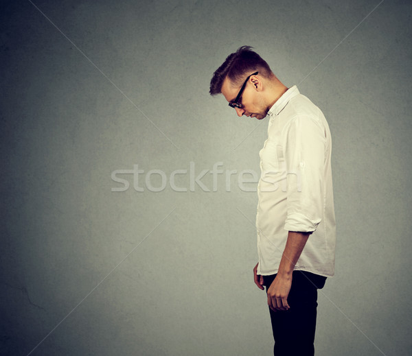 Stock photo: sad lonely man looking down has no energy motivation depressed 