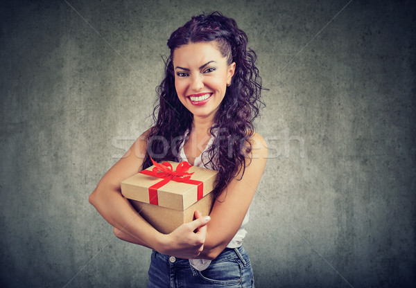 Beautiful woman with a great present Stock photo © ichiosea