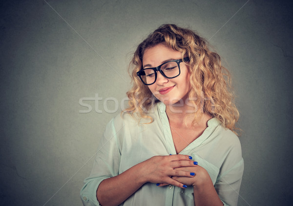 Lack of confidence. Shy young woman feels awkward  Stock photo © ichiosea