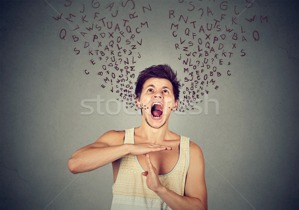 man showing time out gesture letters coming out of mouth Stock photo © ichiosea