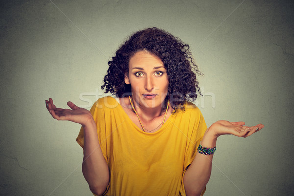 dumb looking woman arms out shrugs shoulders who cares so what Stock photo © ichiosea