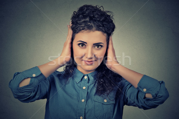 happy attractive casual woman covering with hands her ears eyes opened Stock photo © ichiosea