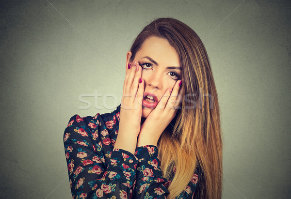 frustrated stressed woman with hands on face upset about to cry Stock photo © ichiosea
