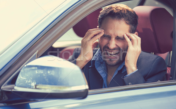 Stressed young man driver sitting inside his car Stock photo © ichiosea