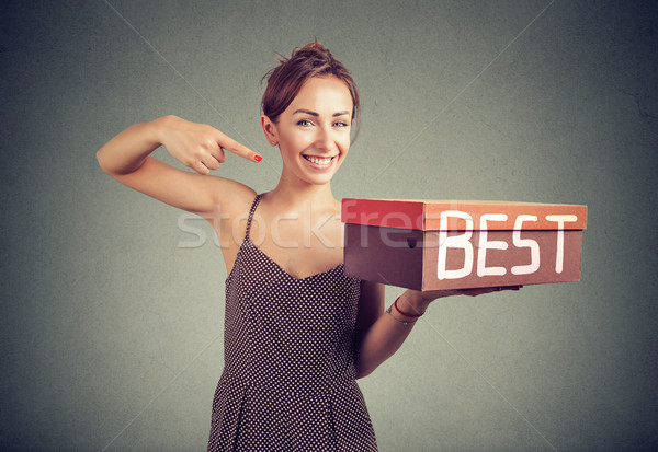 Smiling saleswoman advertising best product Stock photo © ichiosea