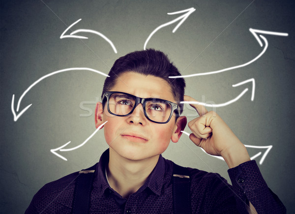 confused thinking man bewildered scratching his head looking up  Stock photo © ichiosea