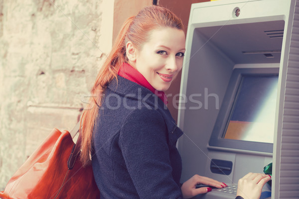 Fiatal boldog nő bankautomata üzlet pénz Stock fotó © ichiosea