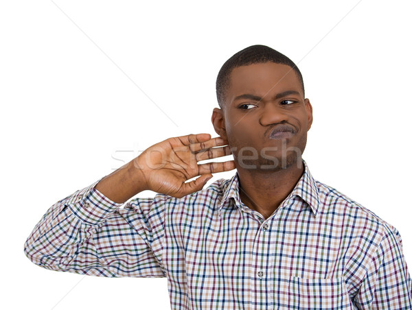 Stock photo: young man looking suspicious