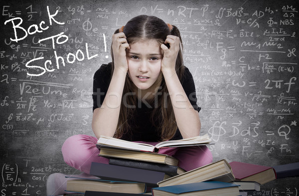 Stressed, tired, overwhelmed little girl, student, pupil Stock photo © ichiosea