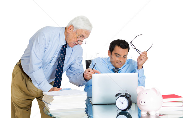 Stock photo: boss checking on his employee