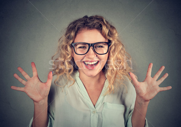 super excited funky looking girl in glasses screaming  Stock photo © ichiosea