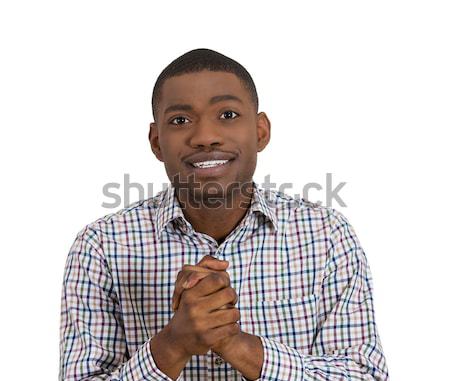 Stock photo: man with clasped hands pleading 