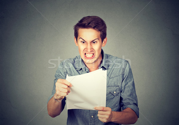 Stock photo: Angry stressed screaming business man with documents papers paperwork 