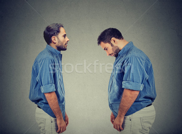 Slim guy looking at fat man himself. Diet choice right nutrition concept Stock photo © ichiosea