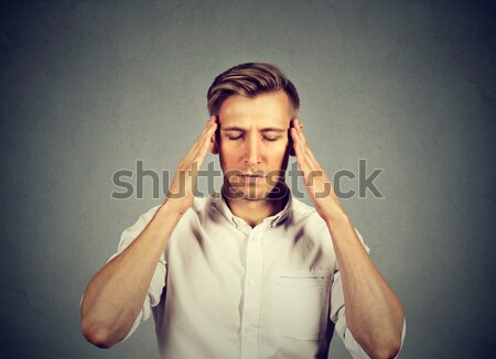 man thinking very intensely concentrating  Stock photo © ichiosea