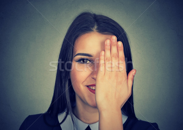 Headshot of a shy girl hiding  Stock photo © ichiosea
