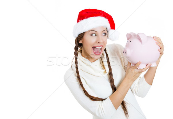 Happy christmas woman holding a piggy bank Stock photo © ichiosea