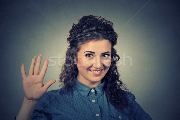 Smiling woman making high five with her hand Stock photo © ichiosea