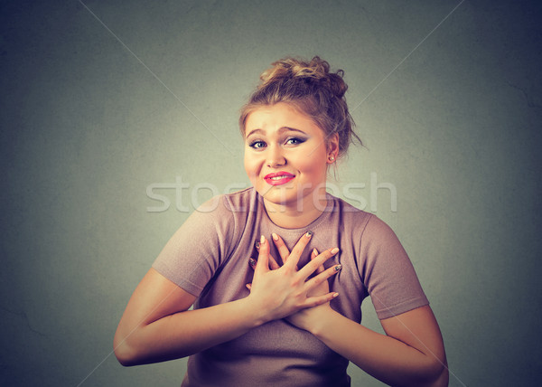 woman gesturing with clasped hands, please forgive me pretty please Stock photo © ichiosea