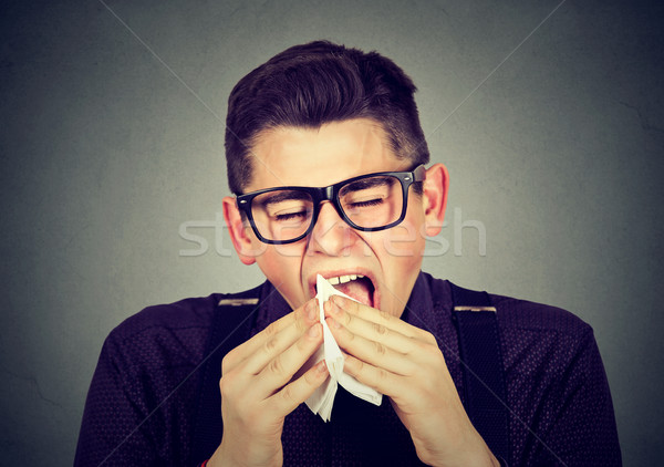 Férfi hideg papírzsebkendő fiatalember szemüveg fiú Stock fotó © ichiosea
