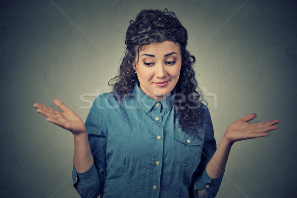 dumb looking woman arms out shrugs shoulders who cares so what I don't know Stock photo © ichiosea