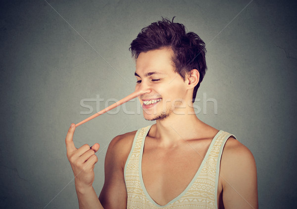 Homme longtemps nez menteur isolé gris [[stock_photo]] © ichiosea