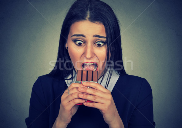 obsessed woman tired of diet restrictions craving sweets chocolate Stock photo © ichiosea