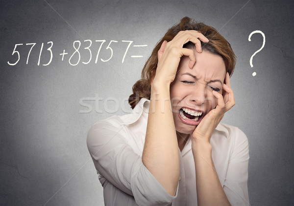 Stressed woman can't solve math problem Stock photo © ichiosea