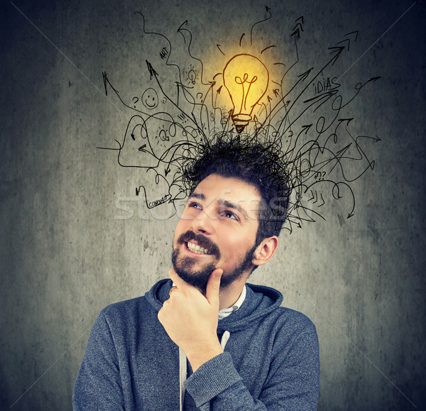 young man has a bright idea  Stock photo © ichiosea