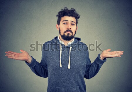 Young man meditating with concentration Stock photo © ichiosea