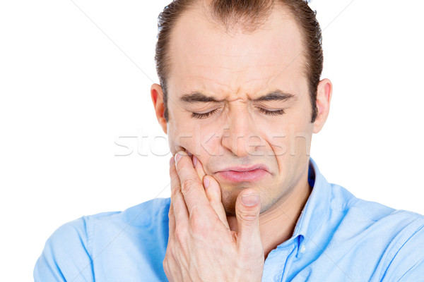 Man with tooth ache Stock photo © ichiosea