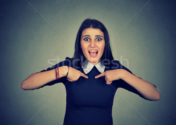 Happy woman screaming pointing fingers at herself, it is me! Stock photo © ichiosea