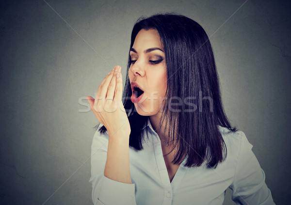 Donna respiro mano alimentare faccia bocca Foto d'archivio © ichiosea