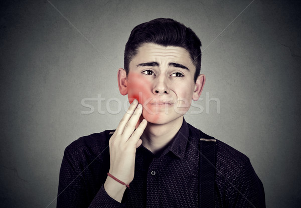 Szomorú fiatalember fogfájás arc férfi egészség Stock fotó © ichiosea