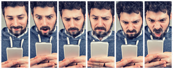 expressive young man using a smartphone Stock photo © ichiosea