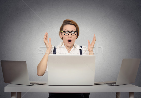 Stressed shocked woman sitting at table in front of computer Stock photo © ichiosea